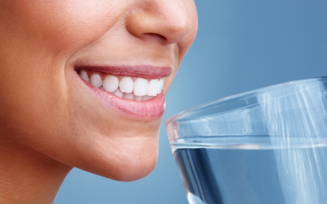 What Role Does Water Intake Play in Supporting Oral Health